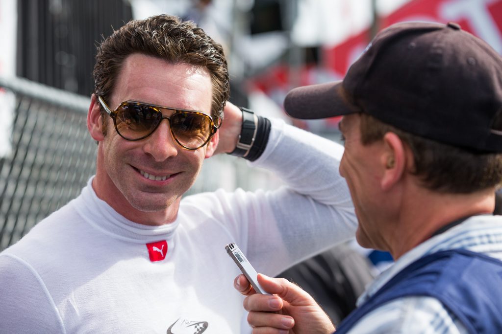2016 IndyCar champion Simon Pagenaud takes a moment to answer questions for media