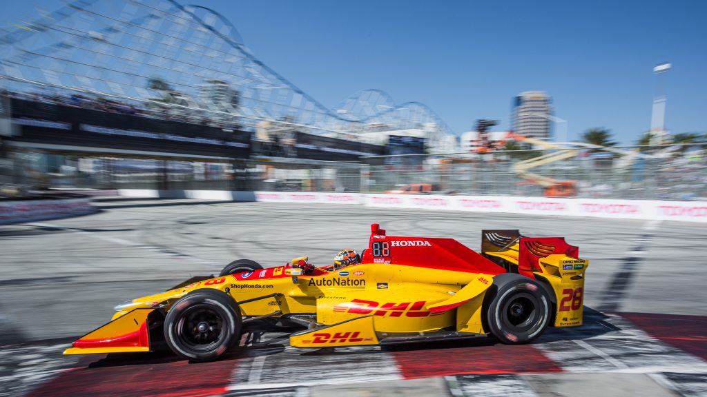 Ryan Hunter-Reay up close, rounding turn 1 at the end of Shoreline Drive